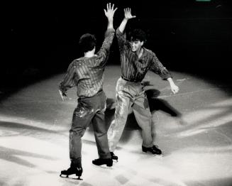 Hot act on Ice. The two figure skating Brians - Boitano (back to camera) and Orser - who squared off against each other at the Calgery Winter Olympics(...)