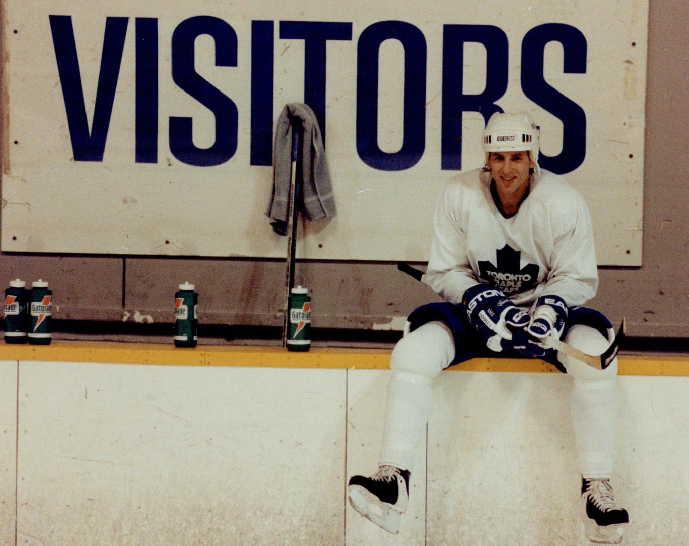 Working up a thirst. Mark Osborne pauses to top up the tank during the Leafs' practice at Varsity Arena yesterday. After the workout, the Leafs shuffl(...)