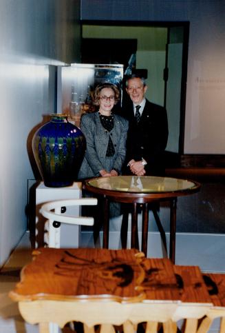 Sylvia and Bernard Ostry pose with some of the 300 Art Deco and Nouveau objects they donated to the Royal Ontario Museum