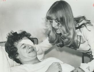 Leaf Goalie Mike Palmateer and his wife, Debi, in Hospital, Eye injury he suffered Saturday will sideline him for at least 10 days