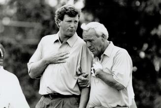 A conspiracy of golfers, Golfing legend Arnold Palmer takes Peter Jacobsen's arm and the two appear to be hatching a plot yesterday against skins competitors Fuzzy Zoeller and Dave Barr