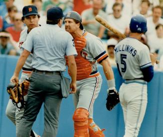 Fighting words, Sparky Anderson, Detroit manager, (left) and Lance Parrish, Tigers' star catcher, didn't see eye-to-eye with rookie umpire Dale Scott (...)