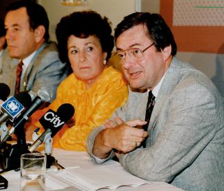 Shirley Carr, president of the Canadian Labor Congress, at a news conference in Toronto last night, promises postal union chief Jean-Claude Parrot all-out support from the unions