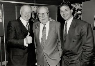 What's up, doc? Tom Pashby, the ophthalmologist who pioneered in better eye protection for hockey players, is saluted at dinner last night by Don Cherry and Leaf Ed Olczyk