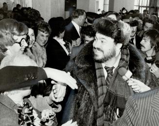 Adulation for singer, Luciano Pavarotti is mobbed by fans as he arrives at the Columbus Centre in North York late this morning