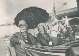 Riding in the rain, Prime Minister and Mrs