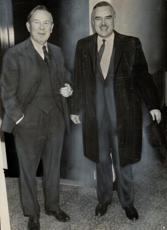 Mike meets John. Prime Minister Pearson and Premier Robarts emerge from the Park Plaza's Royal Suite where they talked for an hour today on an informa(...)