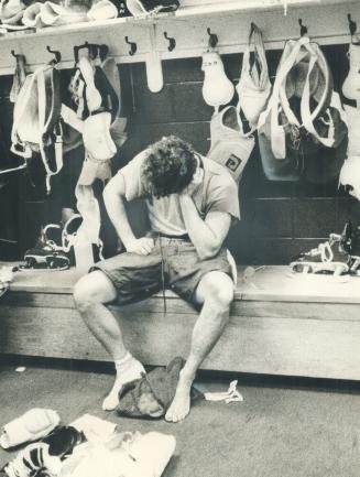Defeat rests heavily. Maple Leaf defenceman Mike Pelyk hangs his head in locker room after team lost, 4-3, to Philadelphia Flyers last night. Flyers r(...)
