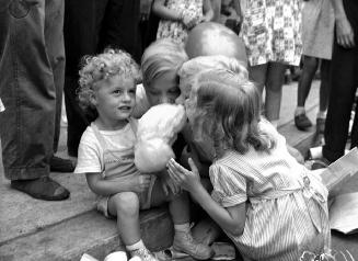 Children with candy floss, Canadian National Exhibition