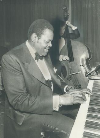 Oscar Peterson opened two-week engagement at the Town tavern last night