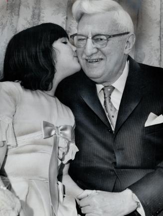 Nate's Birthday. Former mayor of Toronto Nathan Phillips got a 75th birthday kiss last night from his granddaughter Lois Phillips, 9, at the Park Plaza Hotel birthday party