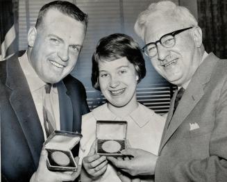 Mayor presents medal to Marilyn Bell and Cliff Lumdon