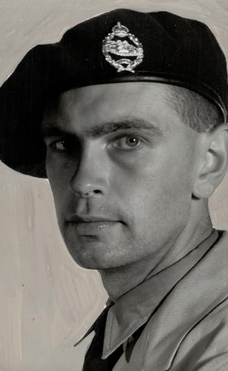 Reporter now tank man. Trooper Norman Phillips Canadian Armored Corps. before joining the army was The Star's Camp Borden reporter