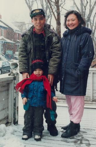 24 years later, Kim Phuc, husband Huy Toan, and son Huy Hoang outside their Toronto home