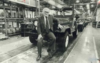 American Motors (Canada) president Bill Pickett with the firm's old faithful, the Jeep