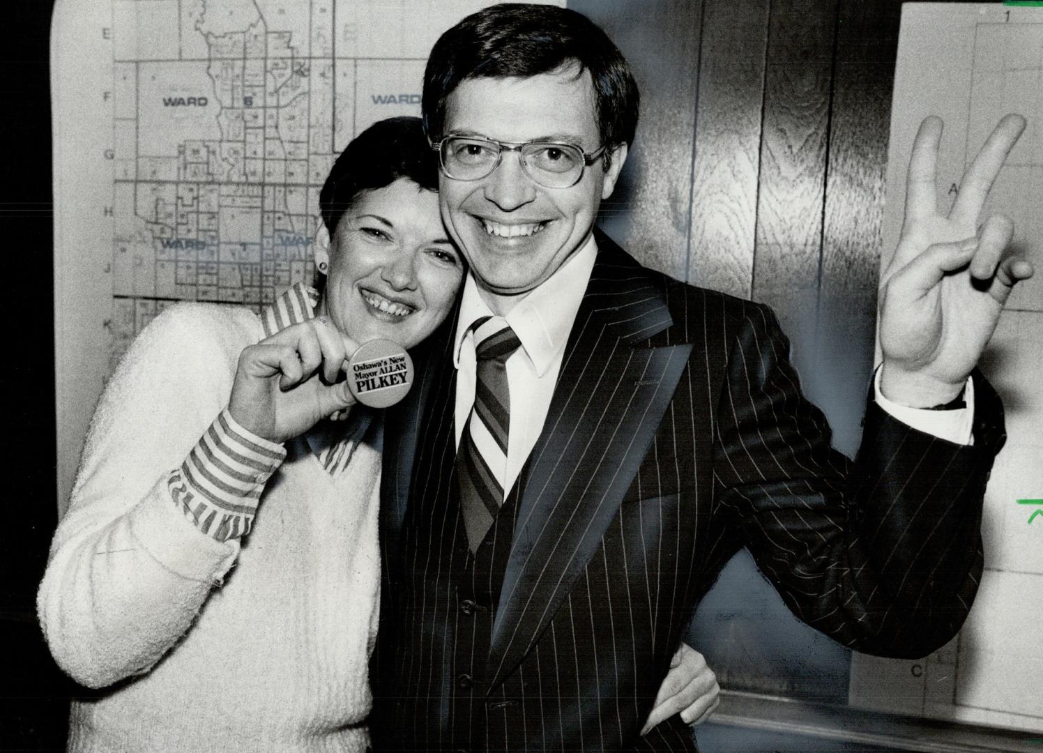 V for Victory. Allan Pilkey gives the V for Victory sign as he hugs his wife at his Oshawa campaign headquarters. Pilkey upset Mayor Jim Potticary for(...)