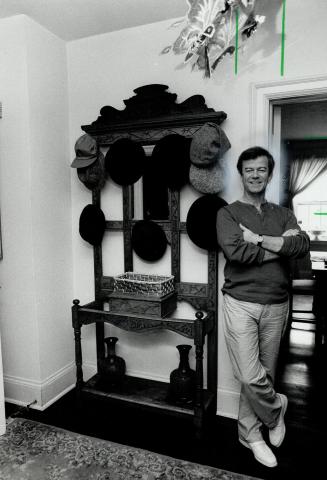 Hat collection, Above, Antique hall stand now showcases Gordon Pinsent's hat collection
