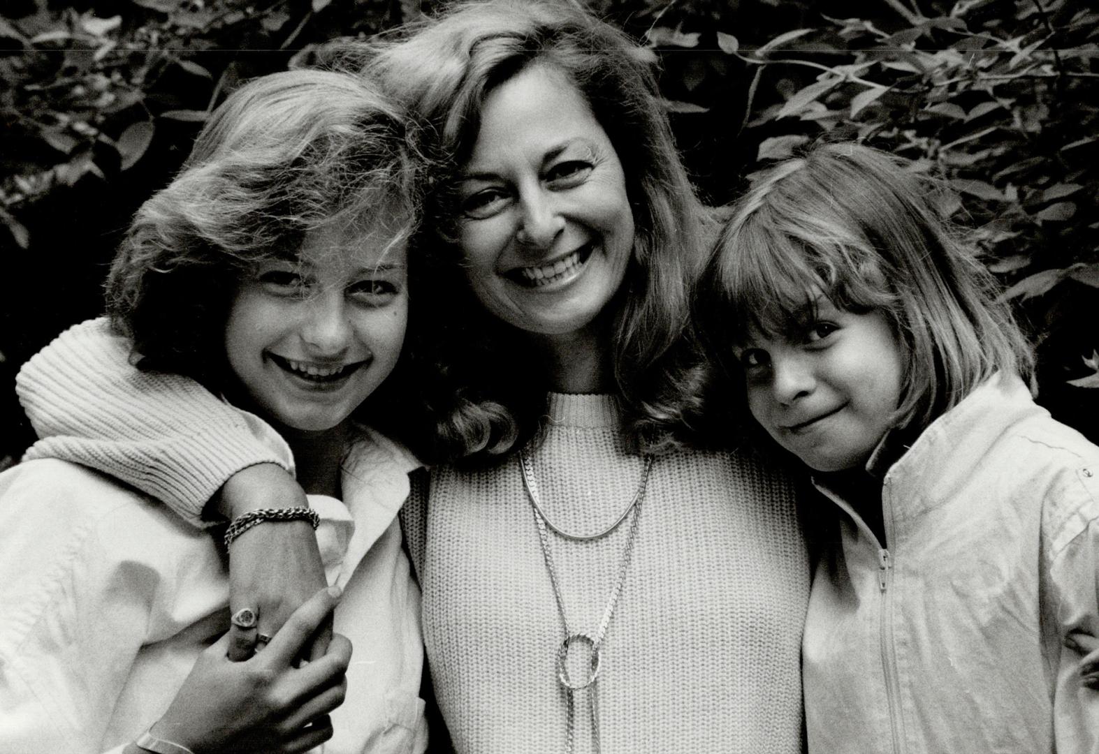 Publisher Anna Porter with daughters Catherine, 13, left, and Julia, 8