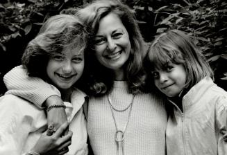 Publisher Anna Porter with daughters Catherine, 13, left, and Julia, 8