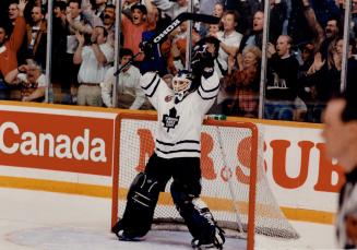 Victory Dance, A jubilant Felix Potvin raises his arms in victory as the never-say-die Leafs edged Detroit 3-2 in a Gardens nailbiter last night, squa(...)
