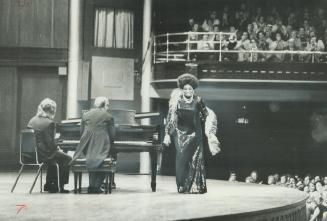 Opera singer Leontyne Price acknowledges the applause of the enthusiastic audience at the end of her conert in Massey Hall last night. Miss Price, who(...)