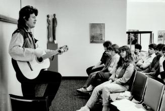 Wandering minstrel, Poet and songwriter Robert Priest visited O'Neill Collegiate students last week