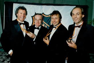 Left to right, Tony Esposito, Star sports columnist Jim Proudfoot, Brad Park and Guy Lafleur were inducted into the Hockey Hall of Fame yesterday. Pro(...)