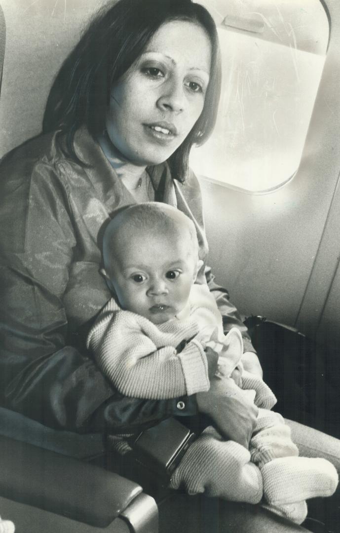 Herbie on the plane with his mother