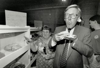 Summer of 42, New Democrat leader Bob Rae eats a slice of birthday cake courtesy of Xenia Muelier at the Hamilton Farmers Market. Rae turned 42 yesterday
