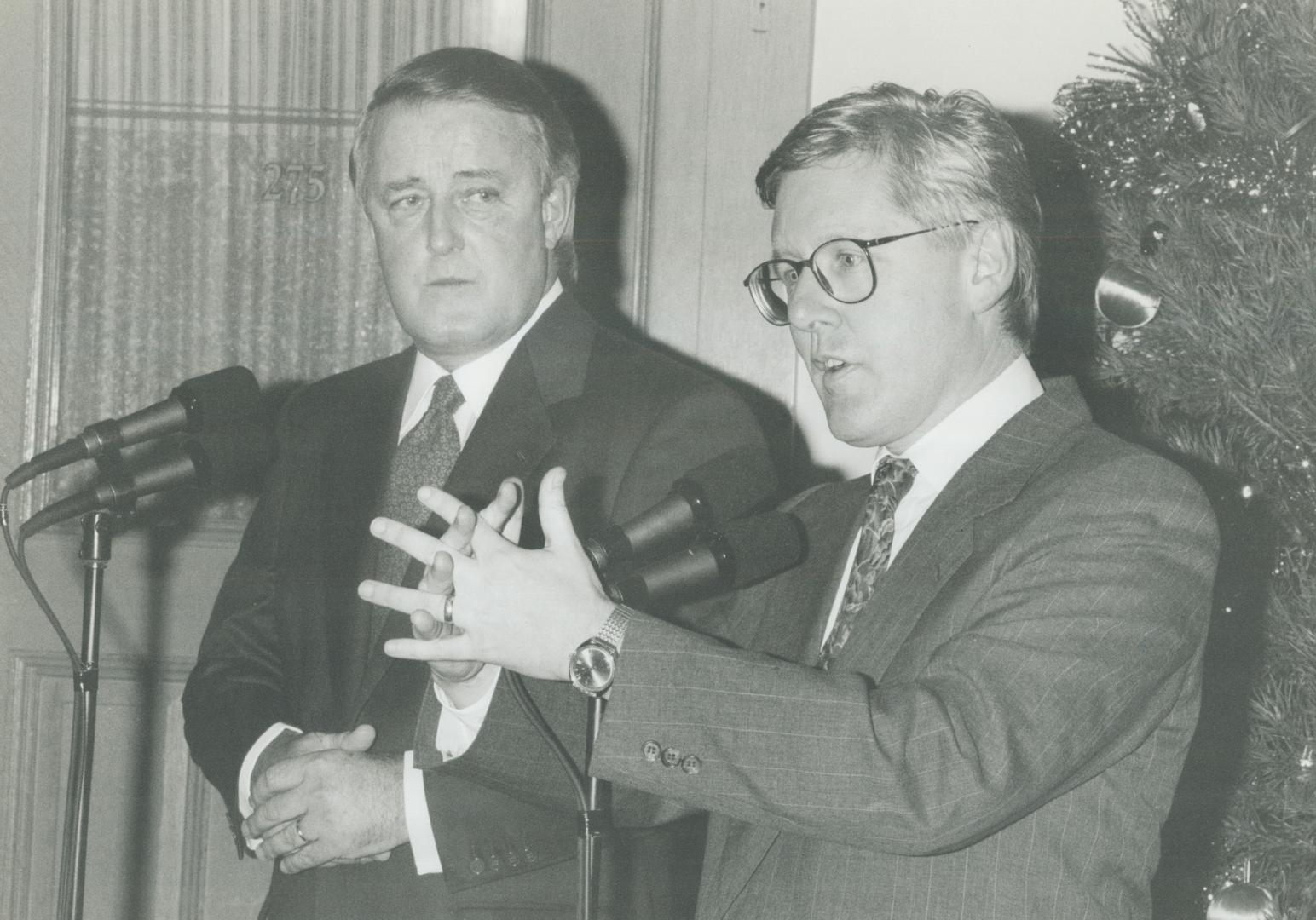 Leaders meet, Ontario Premier Bob Rae gestures while answering reporters' questions yesterday after a meeting at Queen's Park with Prime Minister Brian Mulroney