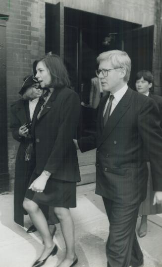 In remembrance, Premier Bob Rae escorts his wife Ariene Perly Rae to a memorial for broadcaster Barbara Frum at Massey Hall yesterday