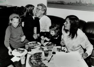 Slice of Rae's life, Premier Bob Rae, wife Arlene Perly Rae and children Lisa, left, Eleanor, centre, and Judith share a pizza in his Queen's Park off(...)