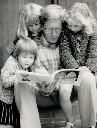 Family fold, New Democrat leader Bob Rae relaxes with his daughters, Eleanor, 2, left front, Lisa, 4, and Judith, 6