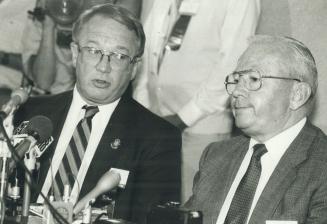 Strike over, Ontario Medical Association President Dr. Richard Railton (left) and Dr. Edward Moran