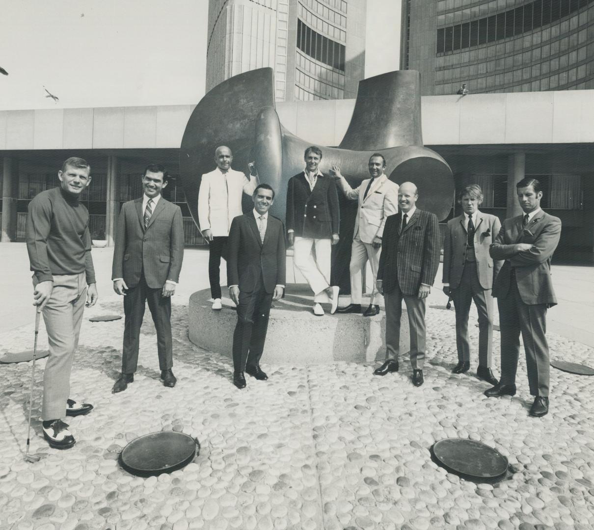 Metro's best-dressed men. The smiling faces of male high fashion pose before Henry Moore's Archer in City Hall Square. These five are among the city's(...)