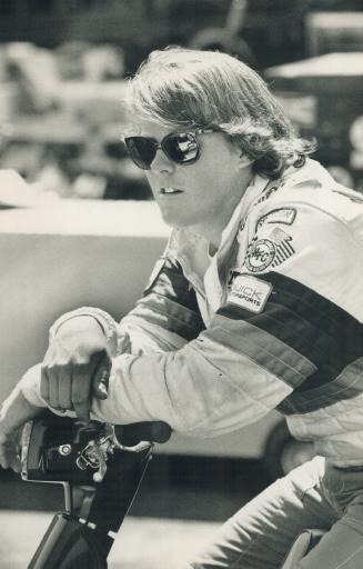 Youthful view: Paul Tracy, 19-year-old racer from Scarborough, surveys action in the pits during an American Racing Series round at Cleveland