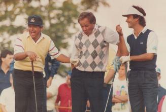 Lee Trevino, left, got his golf game flying early with a birdie on his first hole at the Canadian open today