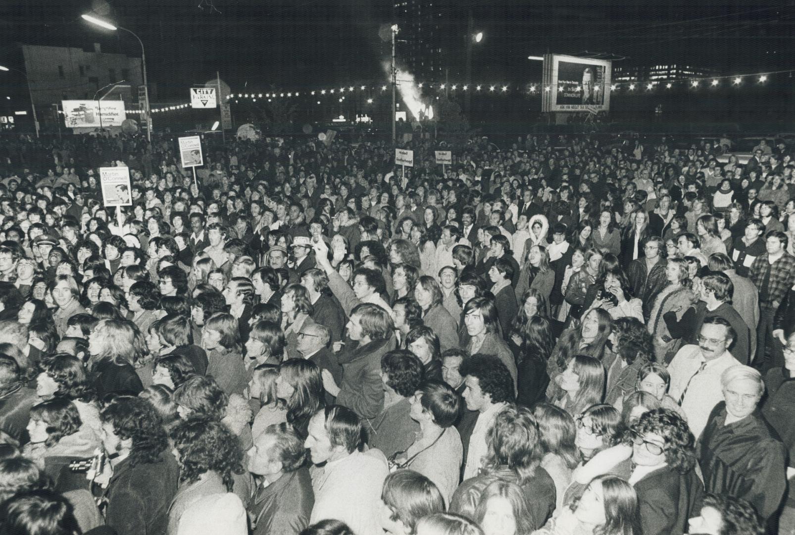 With the 17,000 seats in Maple Leaf Gardens filled, an overflow crowd of about 4,000 mills outside last night, Prime Minister Pierre Trudeau later spoke from a truck