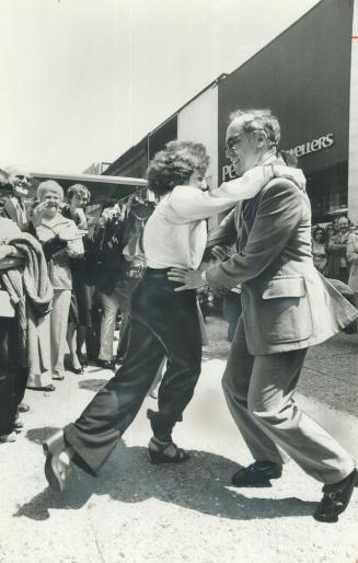 Trudeau dances with a shopper at an Ottawa mall