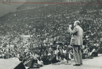 Pierre Trudeau speaks to the masses as 20,000 jam the Liberal rally at Maple Leaf Gardwns last night