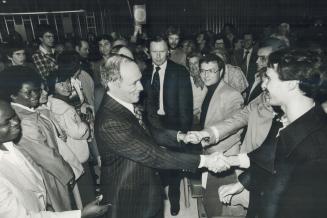 Prime Mnister Pierre Trudeau greets supporters in Toronto