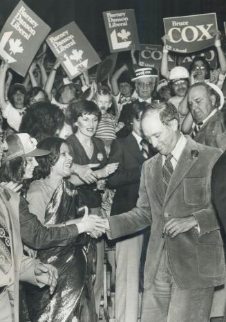 Enthusiastic wellwishers grab Trudeau's hand at a giant Liberal rally in Maple Leaf Gardens