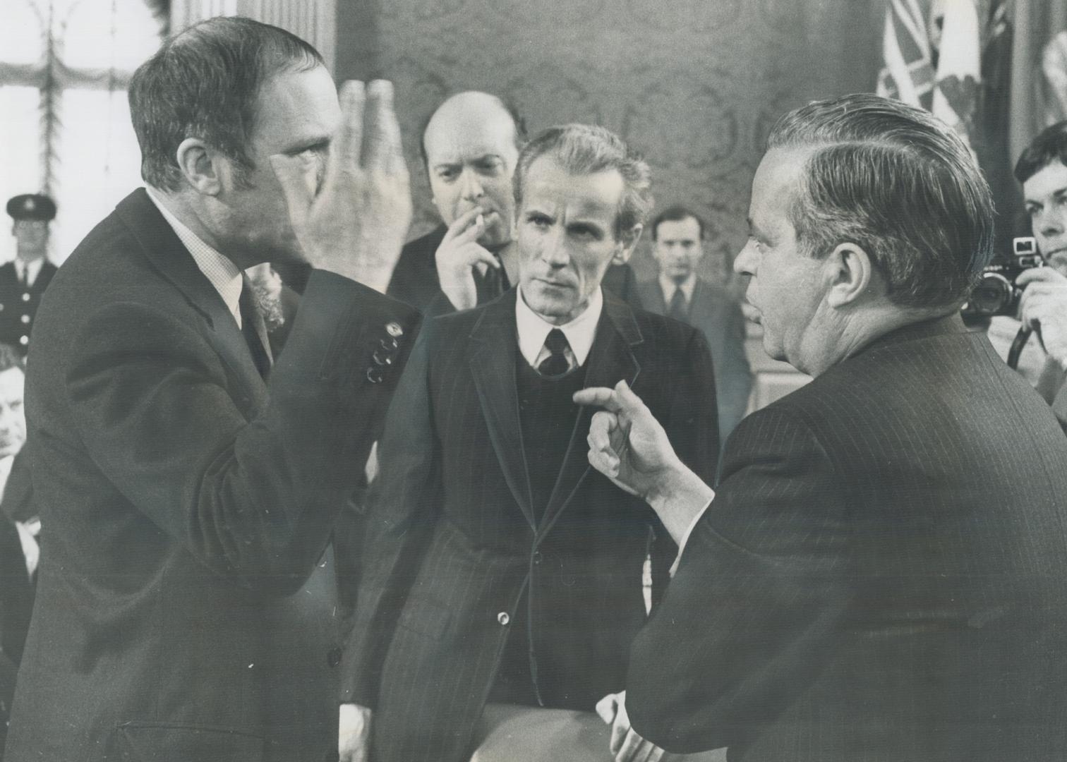 Prime Minister Pierre Trudeau, left, said Tuesday that Quebec Premier Jean Jacques Bertrand was off his rocker if he thought the federal government's (...)