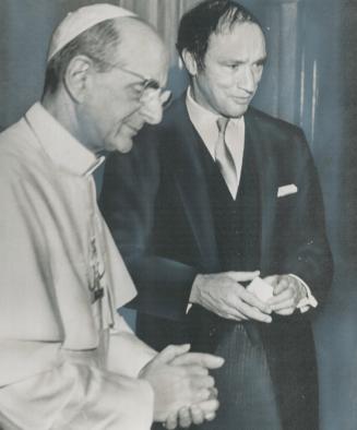 Vatican audience for Prime Minister Pierre Trudeau yesterday with the Pope resulted in a favorable response from the Pontiff to the suggestion that Ca(...)