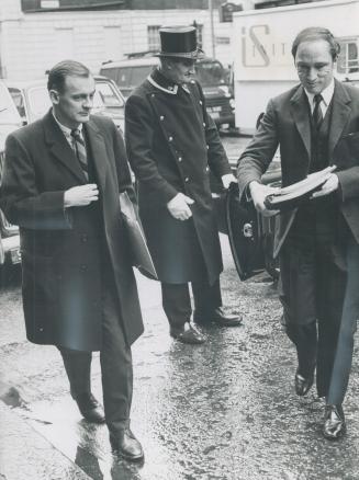 Ivan head, Prime Minister Pierre Elliott rudeau's chief troubleshooter, arrives with his boss at Claridges Hotel, London, where they attended the Prime Ministers' Commonwealth conference