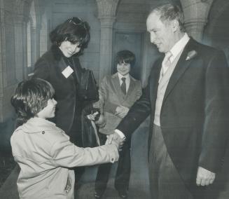 Well done, sir! Young Matthew Kotcheff of Toronto was eager to shake hands with Prime Minister Pierre Trudeau