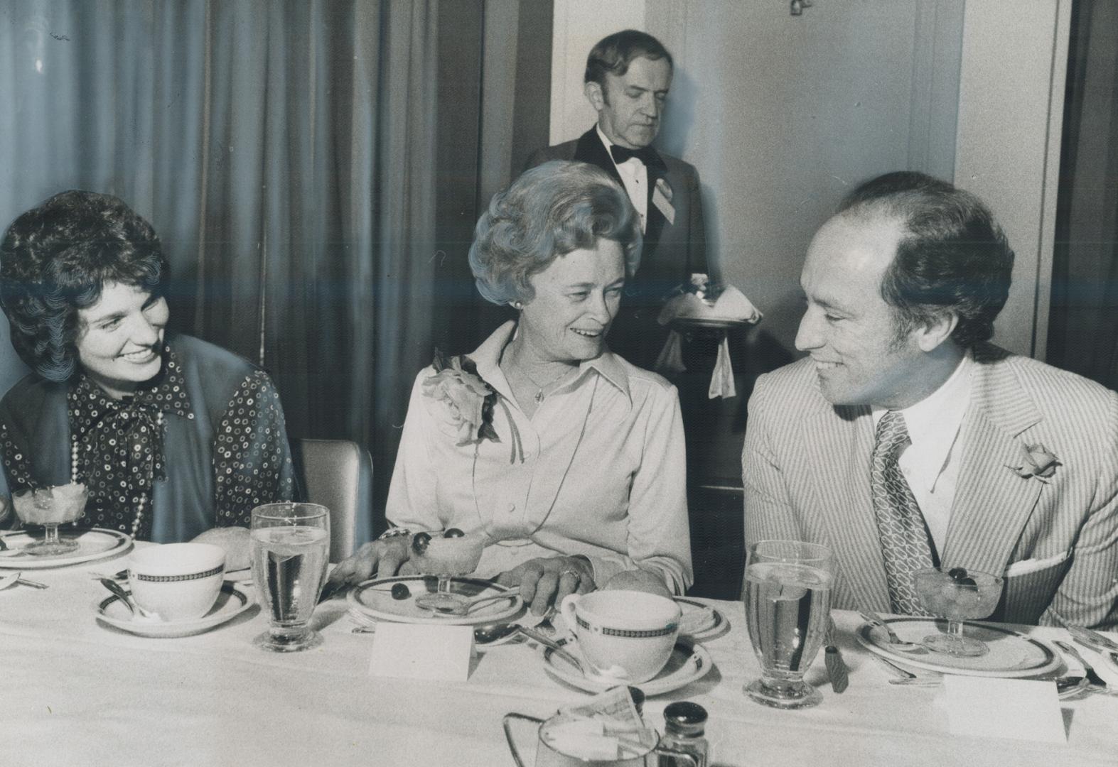 Undisturbed by Picketers outside, Prime Minister Pierre Trudeau and his wife Margaret chat with Mrs