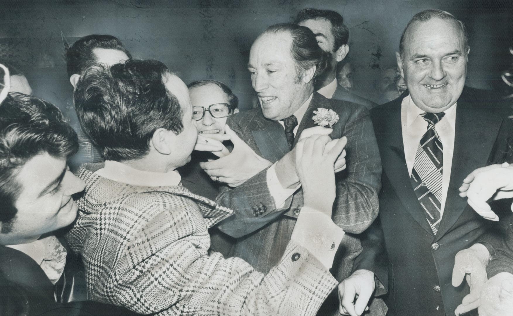 Prime Minister Pierre Trudeau receives greetings from well wishers after officially opening new Hall of Federation of Italian Canadian Associations on(...)