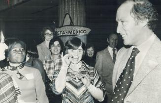 The Mexican Fiesta these women were attending at the Constellation Hotel last night is forgotten for the moment as Prime Minister Pierre Trudeau passes by on his way to a Liberal conference