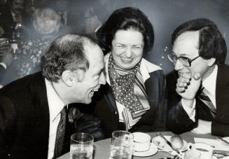 Liberal laughter: Pierre Trudeau (left) enjoys a joke with his Trinity riding candidate, Aideen Nicholson, and Ontario Liberal Leader Stuart Smith before launching into his foreign policy speech